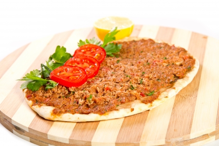 Turkish pizza on a wooden boardの写真素材