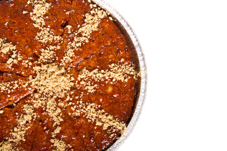 Chocolate cake with crushed nuts