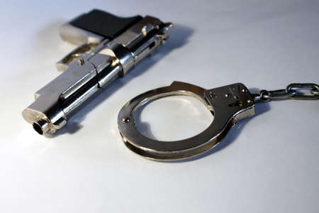 Gun and handcuffsの写真素材