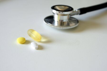 Stethoscope and pillsの写真素材