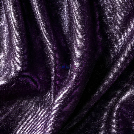 Texture, background, pattern. Silk fabric is purple. Abstract background of luxury fabrics or liquid waves or wavy grunge creasesの素材