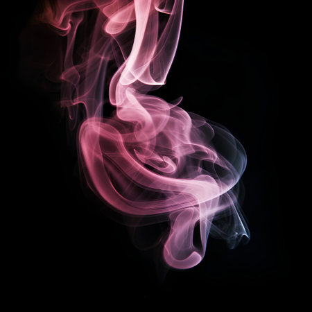 Colorful smoke isolated on black background. Abstract color smoke background.の素材