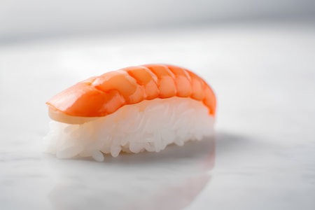 Sushi nigiri on a white background. Shallow depth of field.の素材