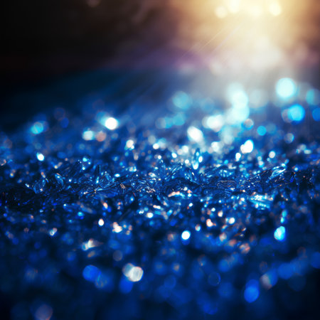 blue glitter christmas abstract background with bokeh defocused lightsの素材
