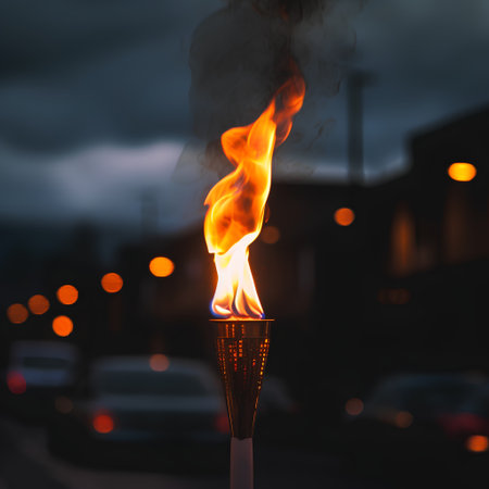 Burning torch on the street of the city at night, close-upの素材