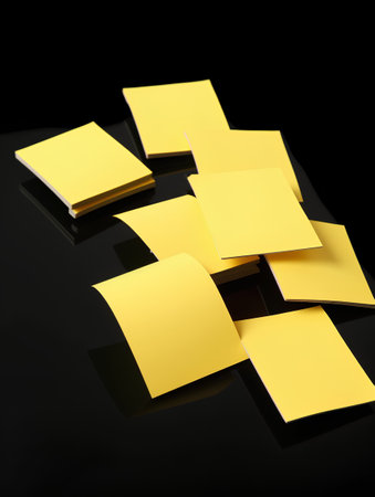 Yellow sticky notes on a black background. 3d render. Business concept.の素材