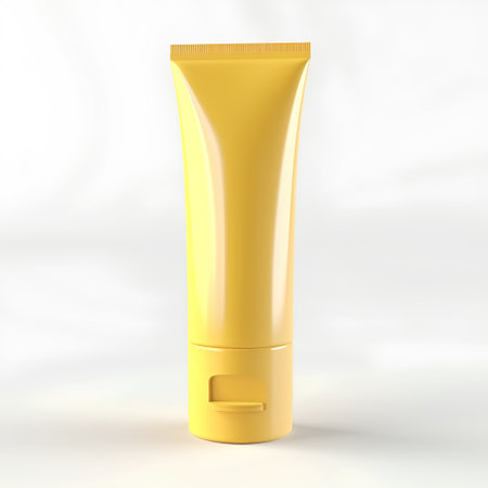 Blank yellow cosmetic tube isolated on white background. 3d renderingの素材