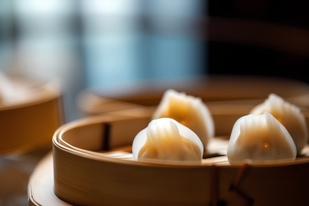 Chinese dim sum in bamboo steamer, shallow depth of field.の素材