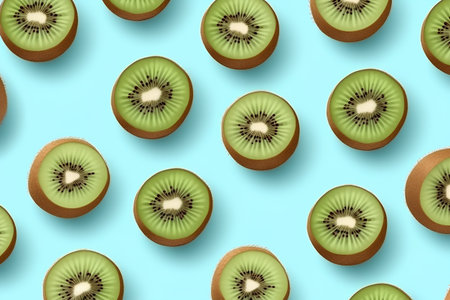 Kiwi fruit on blue background. Seamless pattern.の素材