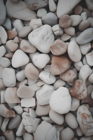 Pebble stones background. White pebbles texture or background.の素材