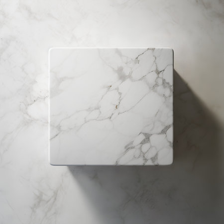 White marble cube on a white marble background. 3d rendering.の素材