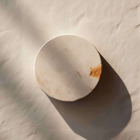 White marble podium on the background of the shadow of the sun.の素材