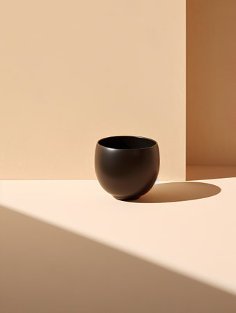 3d rendering of a black ceramic vase on a beige backgroundの素材