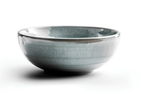 Empty ceramic bowl isolated on white background with clipping path and shadow.の素材