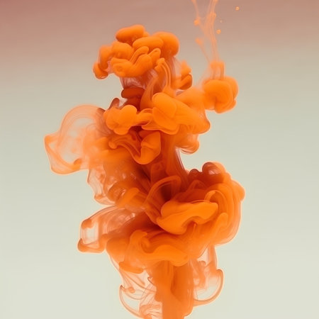 Abstract orange ink in water isolated on white background. Abstract background.の素材
