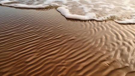 sand and wave in the sea. sand and wave on the beachの素材