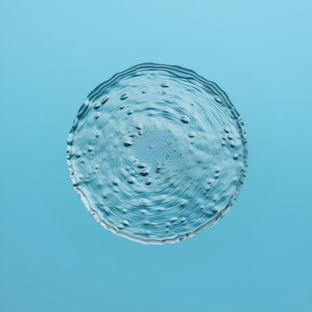 Water drop with ripples on a blue background. 3d renderingの素材