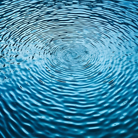 abstract background with ripples on water surface and ripples in blueの素材