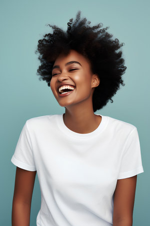 Cheerful african american woman in white t-shirtの素材