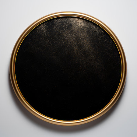 Black round frame with gold border isolated on white background. 3d illustration.の素材