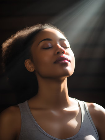 Portrait of a beautiful young african american woman with closed eyesの素材