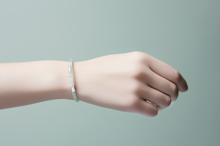 Female hand with bracelet isolated on grey background. Mock up, 3D Renderingの素材