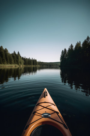 Kayak on a lake in the forest. Beautiful summer landscape.の素材