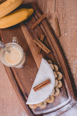 Coconut tapioca with condensed milk | Cassava flour pan, condensed milk and coconut - Typical northeastern Brazilian foodの写真素材