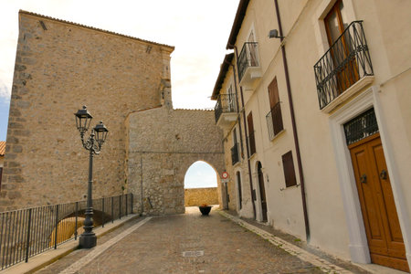 Alleyways. The medieval village of Castel del Monte made up of narrow alleys overlooked by stone houses, inserted in the frame of the Gran Sasso national park. Abruzzo, Italyの写真素材
