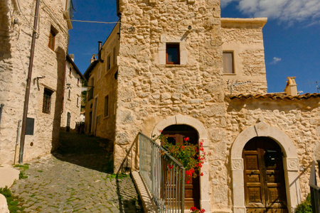 Alleyways. The medieval village of Castel del Monte made up of narrow alleys overlooked by stone houses, inserted in the frame of the Gran Sasso national park. Abruzzo, Italyの写真素材