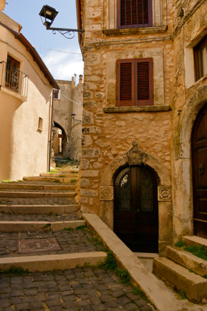 The medieval village of Castel del Monte made up of narrow alleys overlooked by stone houses, inserted in the frame of the Gran Sasso national park. Abruzzo, Italyの写真素材