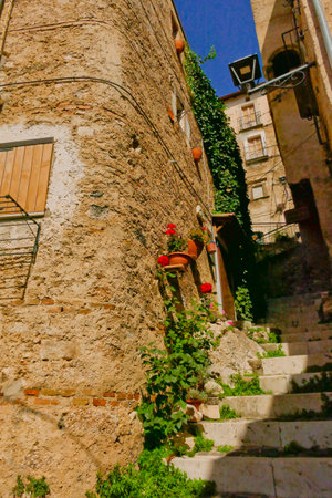 The medieval village of Castel del Monte made up of narrow alleys overlooked by stone houses, inserted in the frame of the Gran Sasso national park. Abruzzo, Italyの写真素材
