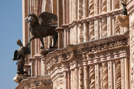 Statue on the facade of the Duomo,Orvieto,middle ages,italian monumentの写真素材