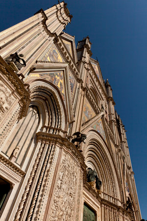 Detail of The Cathedral of Orvieto, one of the greatest artistic achievements of the Italian late Middle Ages with our Gothic-style facadeの写真素材