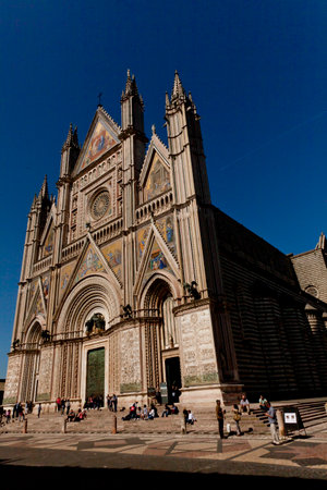 The Cathedral of Orvieto, one of the greatest artistic achievements of the Italian late Middle Ages with our Gothic-style facadeの写真素材