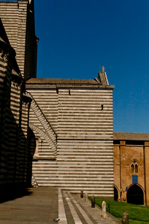 The Cathedral of Orvieto, one of the greatest artistic achievements of the Italian late Middle Ages with our Gothic-style facadeの写真素材