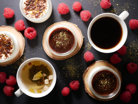 Chocolate desserts. Lying next to the raspberries. View from above. Flat lay.の写真素材
