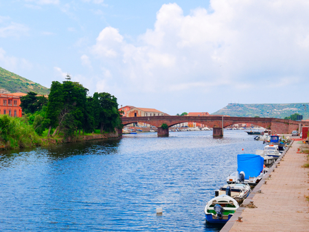 View of the river and fishing boats in the city of Bosa. province of Oristano, Sardinia, Italy.の写真素材