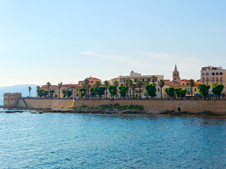 View of the promenade and the old walls of alghero. Alghero, Sardinia..の写真素材