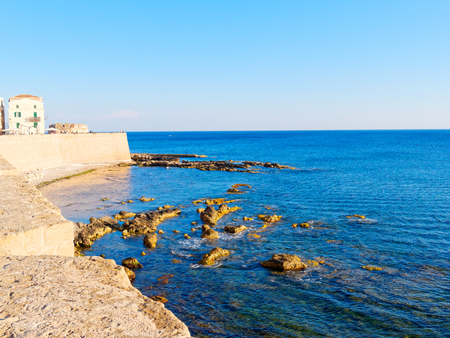 View of the sea and a fragment of Alghero defensive walls. Sardinia.の写真素材