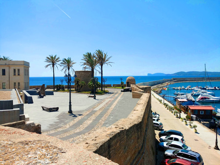 Promenade along the sea and walls in Alghero. Sardinia.
