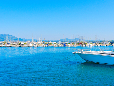 View of the beautiful harbor and boats in Alghero.の写真素材