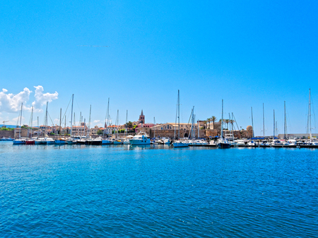 View of the city of Alghero. Shot from the sea. Sardinia.