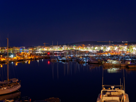 View of alghero at night. A beautiful city vibrant. Sardinia.の写真素材