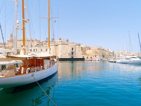 Beautiful old town in Isla. Next to it is a magnificent port. Maltaの写真素材