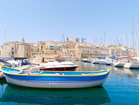 Beautiful old town in Isla. Next to it is a magnificent port. Maltaの写真素材