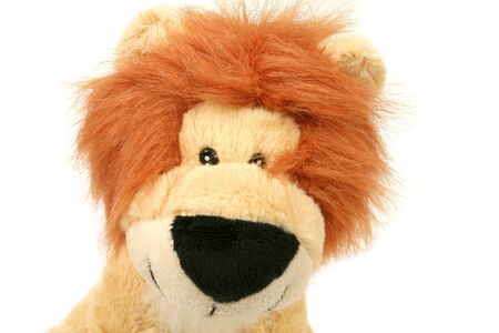 Closeup of plush lion mascot on white. Cheerful animals kingの写真素材