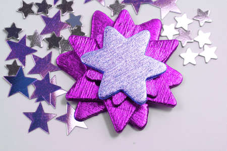 Christmas purple and silver stars ornamentsの写真素材