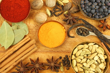 Various spices on wooden board - vintage style backgroundの写真素材
