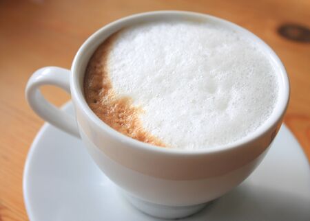 Close-up of cappuccino coffee in white cupの写真素材
